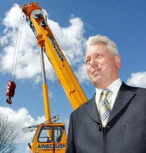 Martin Ainscough infront of crane